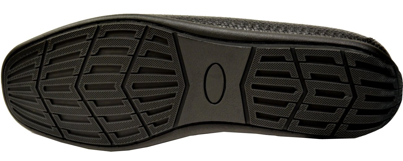 Bottom of AC's black leather loafers