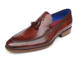 a brown shoe with tassel