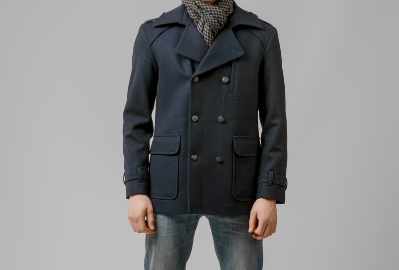 man in a warm peacoat